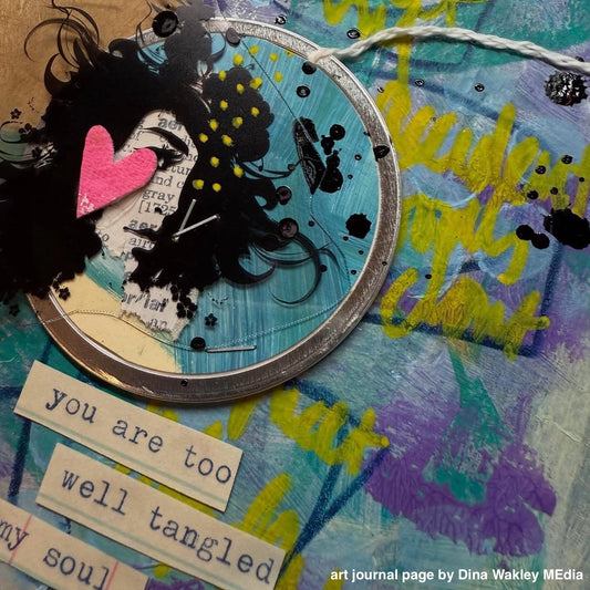 An art journal page created by Dina Wakley MEdia using acrylic paints, ink and sprays on kraft paper surface with words from the Ledger Collage Sheets, an altered metal edge round tag and a Transparency piece of a face.