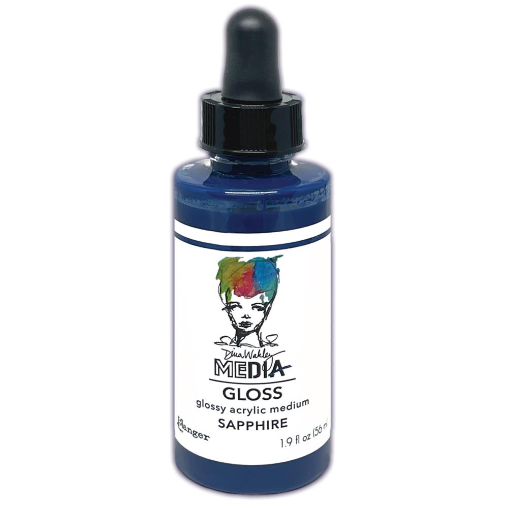 Sapphire (blue) - Gloss Acrylic Medium by Dina Wakley MEdia and Ranger. Each bottle holds 1.9 fl oz (56ml) of colourful fluid paint with the viscosity of thick opaque ink that dries to a smooth finish. Spray, pour, spill, paint or dabble onto all your creations - mixed media, cards, art Journals, through stencils, over masks, onto Chipboard Shapes, artboards and other surfaces.
