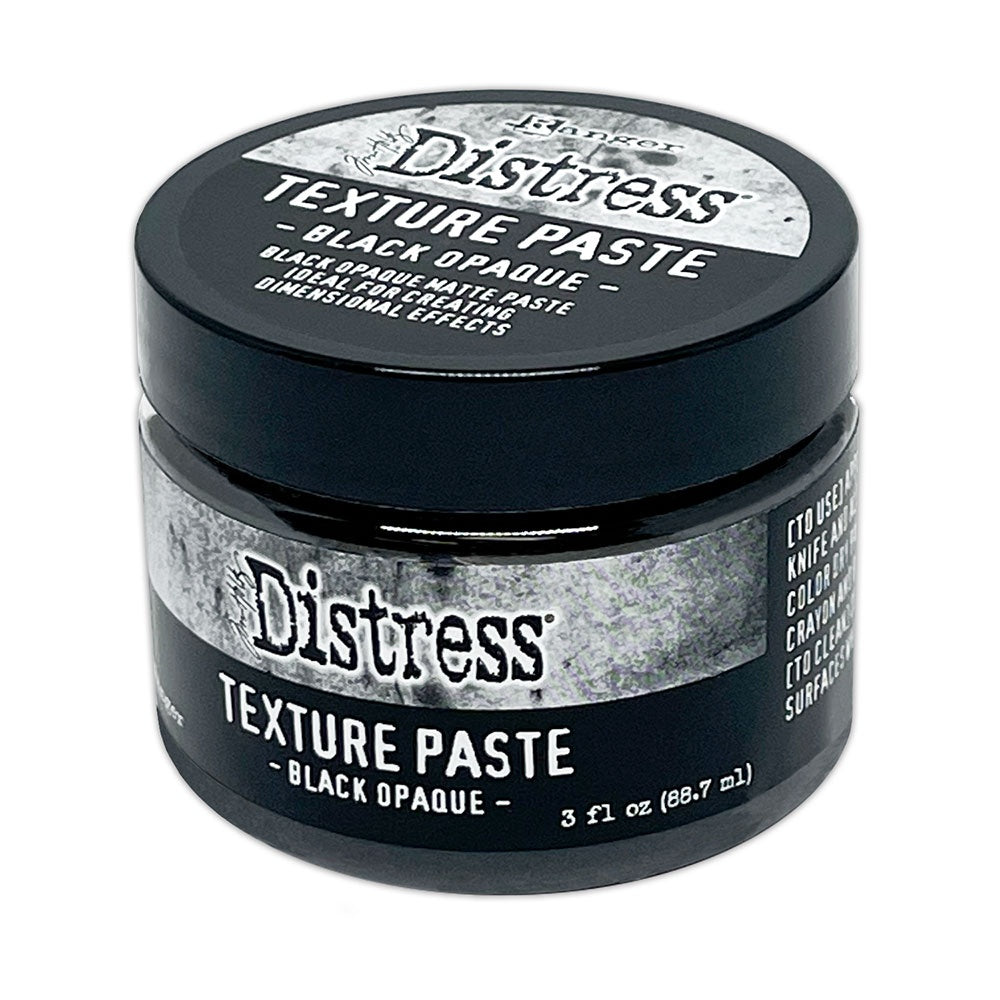 Black Texture Paste - Tim Holtz Distress Dimensional Medium with solid black coverage and matte finish, 3fl oz (88.7ml) jar. Made by Ranger. Tim Holtz Distress Texture Paste in Black is a dimensional medium that dries as you place it, with all the marks, peaks and effects you create. It is smooth dark sooty black medium which dries to an opaque (black) matte finish that is flexible and can be stained, die cut, trimmed, sanded, painted, or altered.