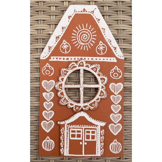 Dyan Reaveley's Dylusions Stampers Anonymous arty crafty example made by Dyan - a gingerbread house made with a Village Cutout Artboard kit using Dylusions red rubber art stamps, white fine embossing powder and a little heat to melt the powder to create a glazed faux enamel finish.