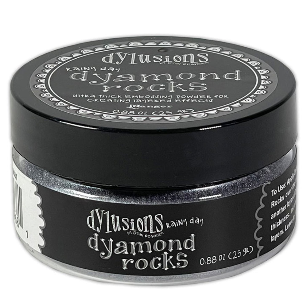 Rainy Day (cool grey)  Dyamond Rocks ... Dylusions by Dyan Reaveley and Ranger Ink. Jar of Ultra Thick Embossing Powder used to create dimension and shaped layers with a smooth, 3-dimensional raised layer with an enamel-like finish. Use with junk journals, book covers, ornaments, decorations, off-the-page creativity, scrapbooks, greeting cards, mixed media, visual sculptured artwork and more. Photo of the jar.