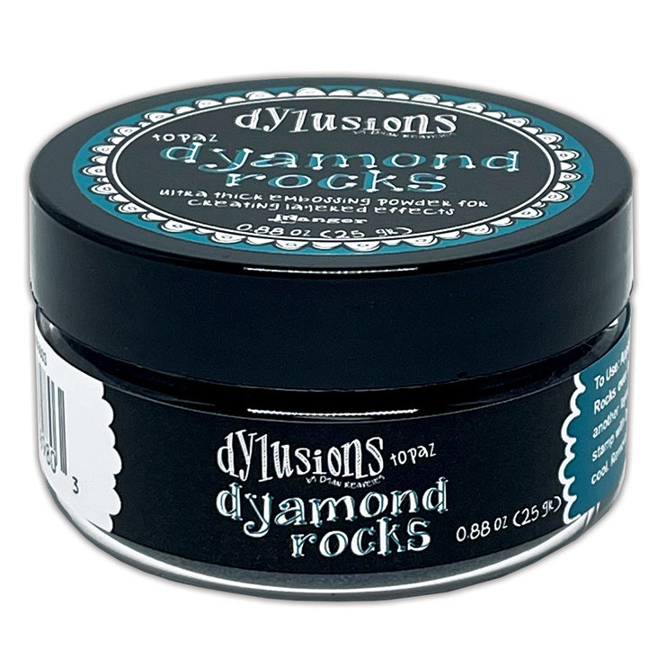 Topaz (metallic sea-blue)  Dyamond Rocks ... Dylusions by Dyan Reaveley and Ranger Ink. Jar of Ultra Thick Embossing Powder used to create dimension and shaped layers with a smooth, 3-dimensional raised layer with an enamel-like finish. Use with junk journals, book covers, ornaments, decorations, off-the-page creativity, scrapbooks, greeting cards, mixed media, visual sculptured artwork and more. Photo of the jar.
