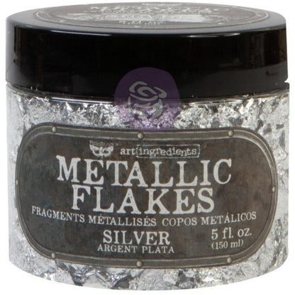 Metallic Flakes - Finnabair Art Ingredients by Prima Marketing ... fragments of metal foil leaf to add stunning effects and gilded finish to mixed media, sculpture, frames, home decor and visual arts. 150ml (5 fl oz) jar. Photo showing the jar of silver leaf.
