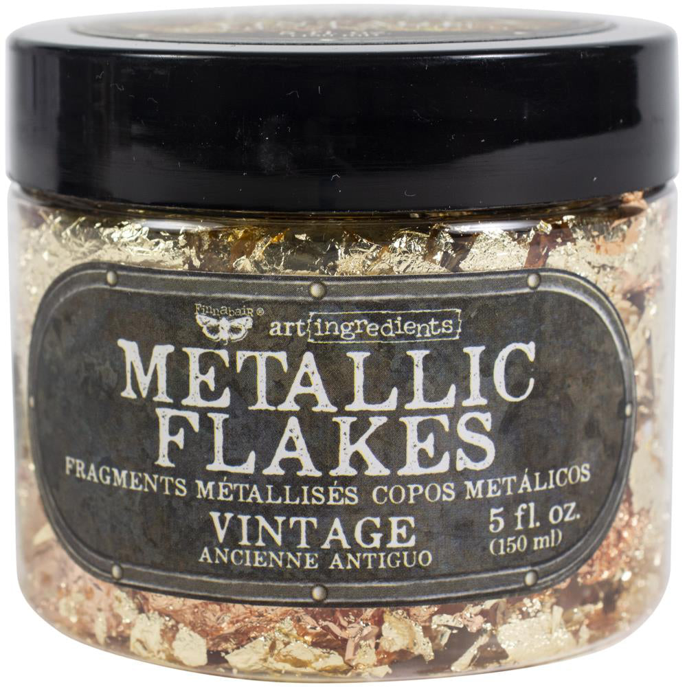 Metallic Flakes - Finnabair Art Ingredients by Prima Marketing ... fragments of metal foil leaf to add stunning effects and gilded finish to mixed media, sculpture, frames, home decor and visual arts. 150ml (5 fl oz) jar. Photo showing the jar of Vintage Leaf.