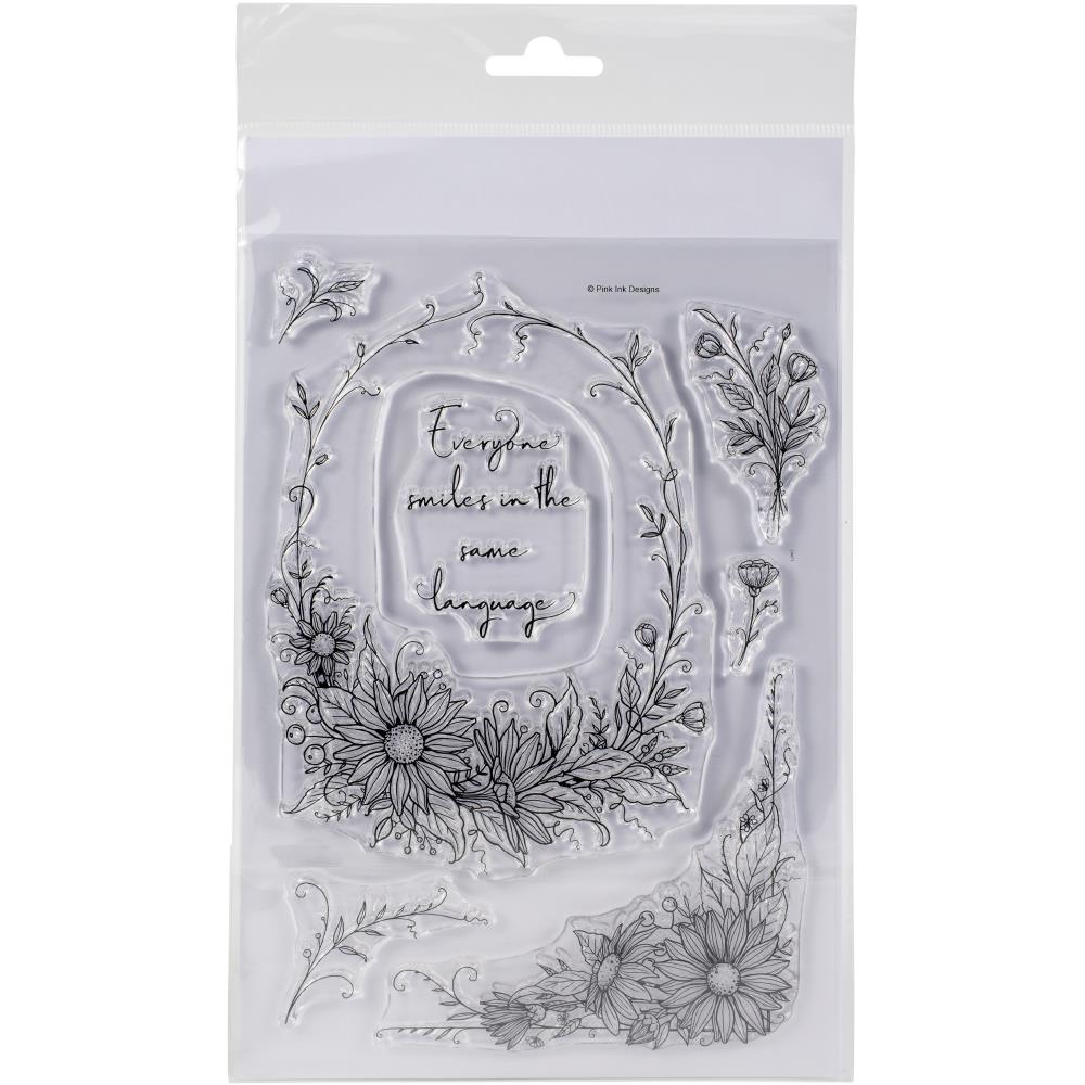 Country Garden - by Pink Ink Designs (Pi073) ... Set of 7 (seven) clear cling stamps to use in papercrafts, scrapbooking, cardmaking, textile arts and other crafty projects. 
This beautiful set of stamps features daisies (flowers) in an oval frame and a corner piece along with other delicate flowers and a phrase - everybody smiles in the same language - in a wonderful freestyle script.