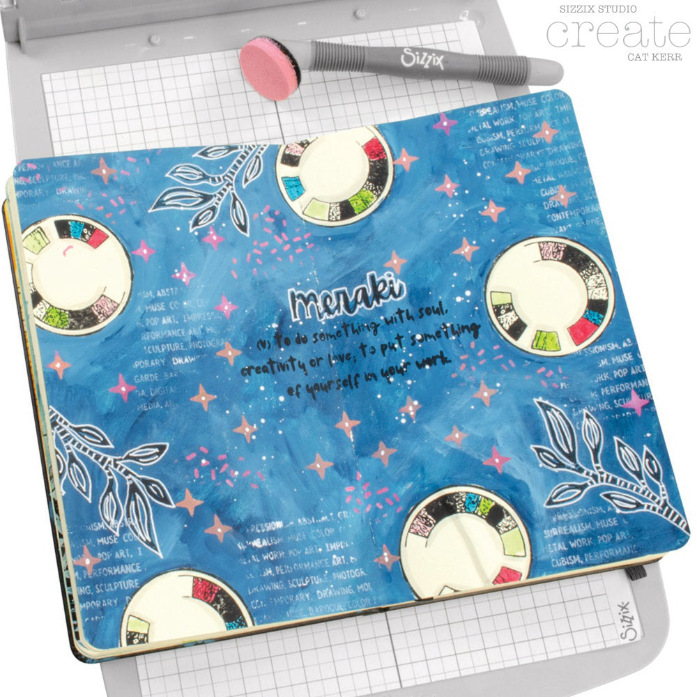 Create - Stencils and Stamps ... Sizzix Studio Mixed Media Kit ... by Cat Kerr and Sizzix. Layering art stencils and clear acrylic stamps to use for mixed media, papercrafts, art journaling, visual arts of all kinds. 7 stamp designs and 3 stencil sheets with coordinating patterns. Designs feature swirls, spatters, leafy branch, circle with shapes within, a block of text (uppercase, fine text) with many ways to describe "art", and Meraki definition. Photo of an example using the Sizzix Tools