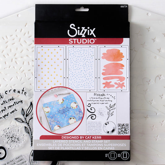 Create - Stencils and Stamps ... Sizzix Studio Mixed Media Kit ... by Cat Kerr and Sizzix. Layering art stencils and clear acrylic stamps to use for mixed media, papercrafts, art journaling, visual arts of all kinds. 7  stamp designs and 3 stencil sheets with coordinating patterns. Designs feature swirls, spatters, leafy branch, circle with shapes within, a block of text (uppercase, fine text) with many ways to describe "art", and Meraki definition. Photo of the packaging.