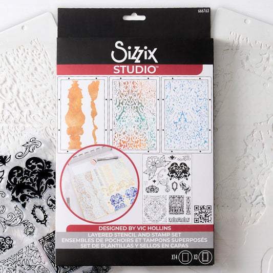Ornate - Stencils and Stamps ... Sizzix Studio Mixed Media Kit ... by Vic Hollins and Sizzix. Layering art stencils and clear acrylic stamps to use for mixed media, papercrafts, art journaling, visual arts of all kinds. The stamp designs in this set includes beautiful detailed flourishes, floral elements, leafy pattens, birds, a small oval frame, edging and more. A total of 14 stamp designs and 3 stencils. Stencil designs include a pair of rugged abstract stripes and two lacy background patterns.