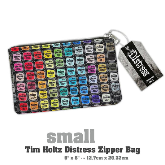 Zipper Bag - Small ... by Tim Holtz and Ranger - Celebrating 20 Years of Distress with every colour of the Distress Rainbow. Printed canvas storage pouch lined in black water resistant fabric with a silver metal zipper and rectangle shaped pull-tag. Beautiful accessory pouch, Distress storage bag or pencil case. Size is 5" x 8" (12.7cm x 20.32cm).