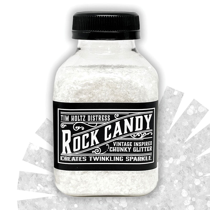 Chunky - Rock Candy Distress Dry Glitter - by Tim Holtz and Ranger ... A crystal clear, light sparkly multi-sized large chunky glitter. Jar contains 4.7oz (133g) jar.
Tim's 'Chunky' Distress Dry Glitter is a vintage inspired, multi-sized large translucent glitter which creates twinkling chunky sugary sparkle everywhere you go. TDR92681