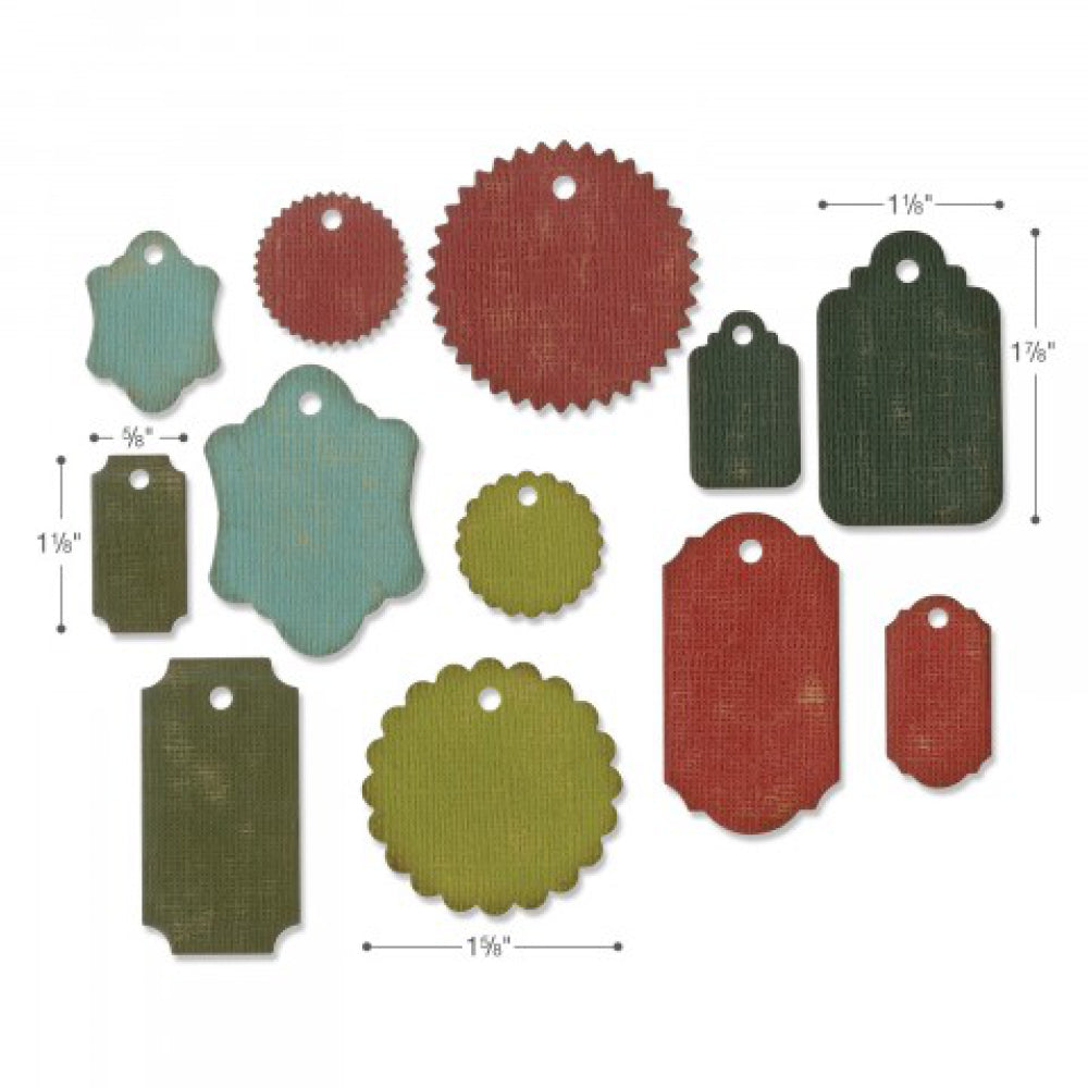 Gift Tags - Sizzix Thinlits die cutting templates by Tim Holtz. Create personalised tags out of paper, cardstock, vellum and tissue for mixed media, papercrafts, scrapbooking, bookmaking and more (no.662423). 12 (twelve) templates.
This set of Thinlits includes a variety of tag shapes with drilled holes, including scallop circle, zigzag circle, rectangles with rounded corners and concave corners, and more. Perfect for junk journals, gifts, artwork, scrapbooking. Sizes.
