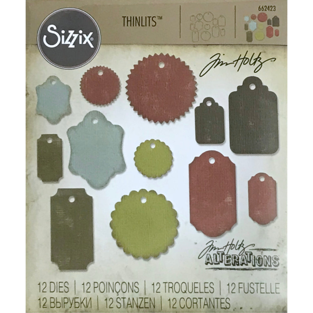 Gift Tags - Sizzix Thinlits die cutting templates by Tim Holtz. Create personalised tags out of paper, cardstock, vellum and tissue for mixed media, papercrafts, scrapbooking, bookmaking and more (no.662423). 12 (twelve) templates.
This set of Thinlits includes a variety of tag shapes with drilled holes, including scallop circle, zigzag circle, rectangles with rounded corners and concave corners, and more. Perfect for junk journals, gifts, artwork, scrapbooking.