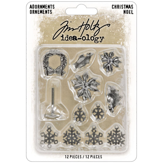 Christmas Noel Charms and Stand ... Idea-Ology Metal Adornments by Tim Holtz. Beautifully detailed bright silver coloured metal miniature pieces to use as embellishments for display makes, mixed media, paper crafts, card making, papercrafts, scrapbooking and visual creative arts. 12 (twelve) pieces.
Tim Holtz Idea-Ology Metal Adornments include holly, poinsettia flowers, snowflakes in 2 sizes, a wreath with a stand.  TH94445