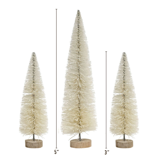 Alpine Trio - Woodland Trees ... by Tim Holtz Idea-Ology ... natural bristle pine trees for use as decorations, displays and ornaments, mixed media, papercraft, and visual crafts. 3 (three) trees in 2 sizes, one x 5 inch tall and two x 3 1/2 inch tall. Each has a wooden disc base and twisted wire stem. TH94453