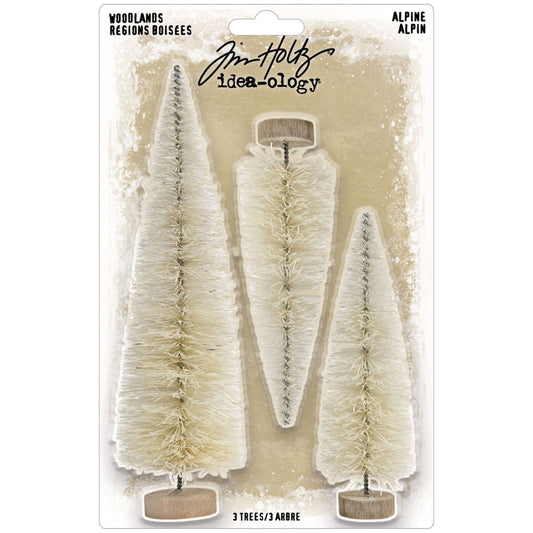 Alpine Trio - Woodland Trees ... by Tim Holtz Idea-Ology ... natural bristle pine trees for use as decorations, displays and ornaments, mixed media, papercraft, and visual crafts. 3 (three) trees in 2 sizes, one x 5 inch tall and two x 3 1/2 inch tall. Each has a wooden disc base and twisted wire stem. TH94453