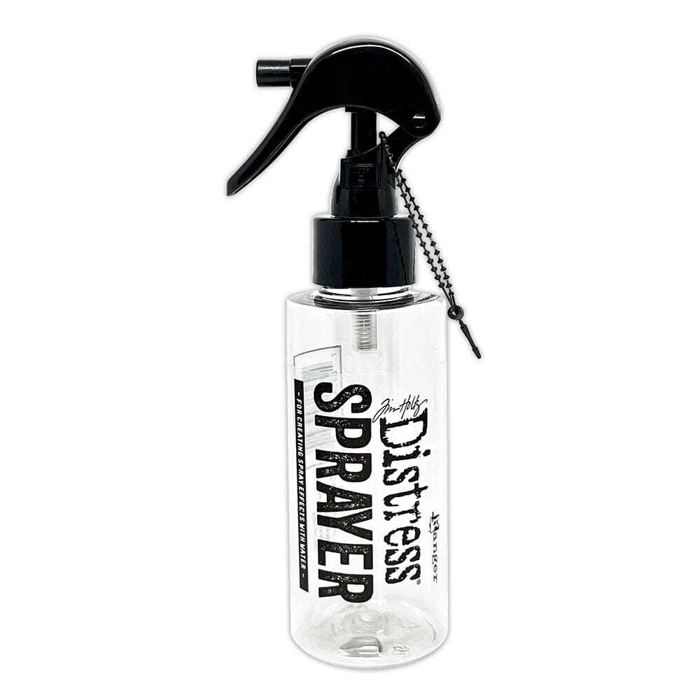 This is the Tim Holtz Distress Sprayer - with a beautifully stylish modern label by Tim Holtz and Ranger ... Empty spritzer bottle for spray effects in art ... holds up to 4 fl oz. Use with water or ink, has a locking mechanism (flip switch) for travel and storage. Pack contains 1 (one) empty 4 (four) fluid ounce bottle with large trigger sprayer, clear plastic with black sprayer. Overall size is 16cm high, main part of the bottle is 93mm x 43mm wide.