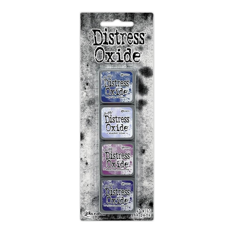 Mini Distress Oxide Ink Pads - Set 5 - by Tim Holtz and Ranger ... featuring water-reactive dye and pigment ink fusion that creates an oxidised effect when spattered, stamped, brushed and or sprayed with water. The colours are opaque and dry with a soft matte finish. Set of 4 (four) colours, one of each (TDIK91516).
Colours in this set are ...
- Prize Ribbon
- Shaded Lilac
- Seedless Preserves
- Villainous Potion
... one of each colour.