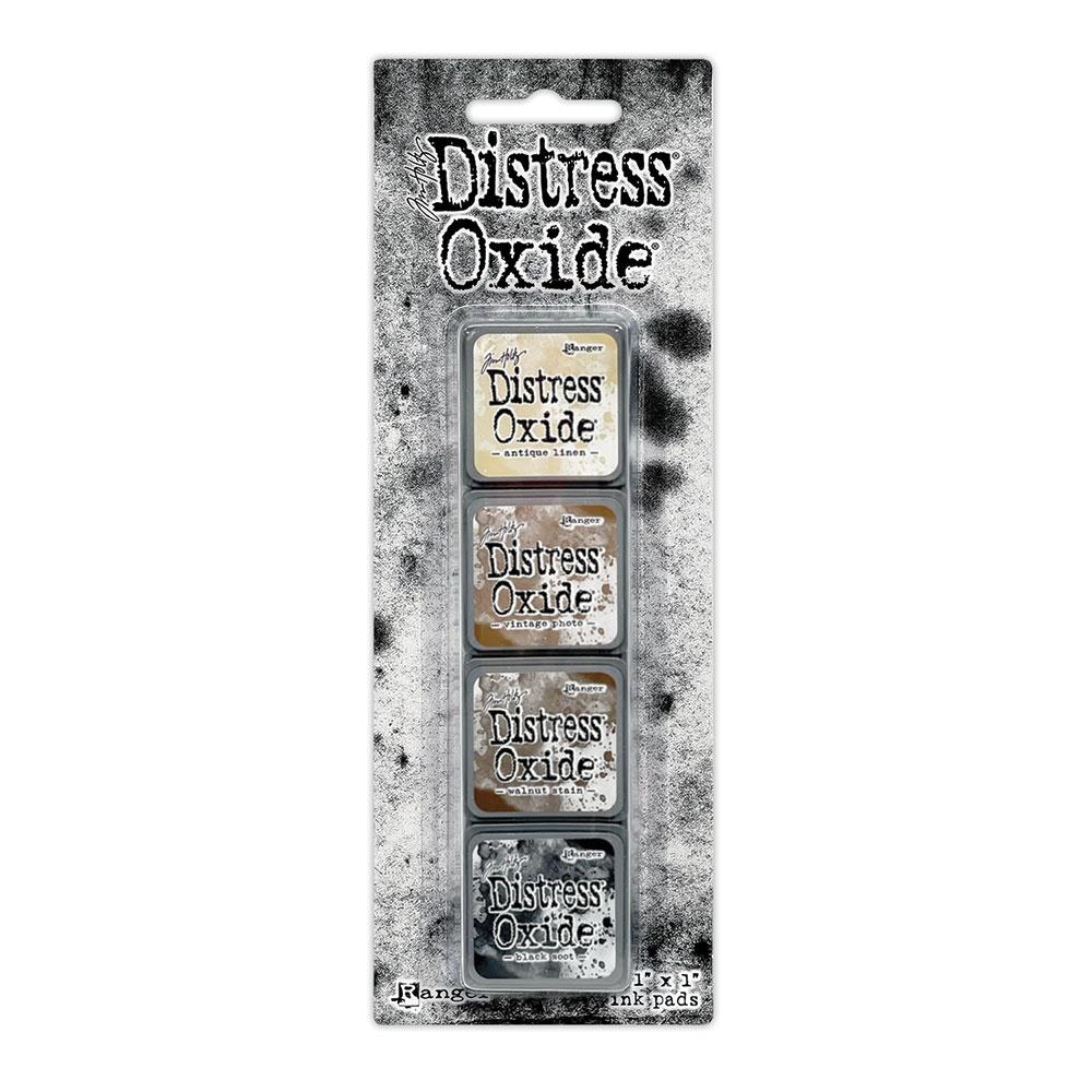 Mini Distress Oxide Ink Pads - Set 6 - by Tim Holtz and Ranger ... featuring water-reactive dye and pigment ink fusion that creates an oxidised effect when spattered, stamped, brushed and or sprayed with water. The colours are opaque and dry with a soft matte finish. Set of 4 (four) colours, one of each (TDIK91523).
Colours in this set are ...
- Antique Linen
- Vintage Photo
- Walnut Stain
- Black Soot
... one of each colour.