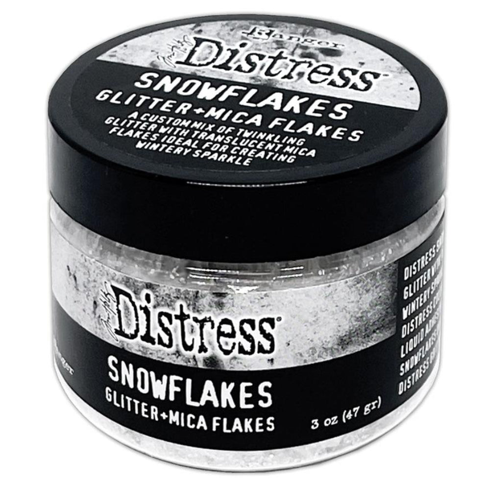 Snowflakes - Mica Flakes and Sparkly Dry Glitter ... by Tim Holtz Distress and Ranger. 3fl oz (88.7ml) jar. Made by Ranger. Tim Holtz Distress® Snowflakes combines a custom mix of twinkling glitter with translucent mica flakes for a nostalgic wintery sparkle. Adhere Snowflakes with Distress Collage Medium, Ranger Glossy Accents, or other liquid adhesives.