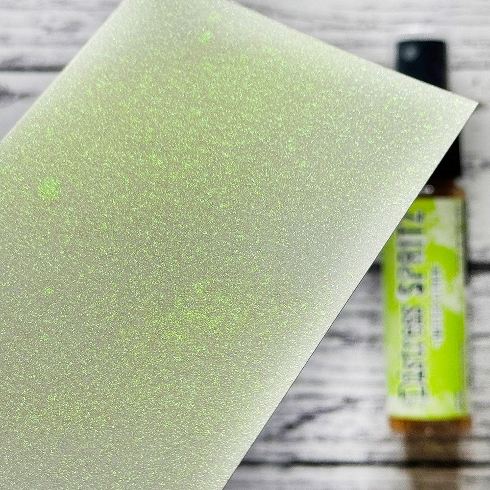 swatch of lime green, Twisted Citron - Distress Spritz ... by Tim Holtz and Ranger - a pearlized Distress ink fusion of colourful mica pigment and clear medium to create a shimmery splattery effect on paper and card surfaces. Each bottle contains 1 fl oz (29ml) with a fine sprayer nozzle and easy to hold container. Enjoy adding Distress Spritz shimmery effects with cardmaking, scrapbooking, mixed media and journaling.