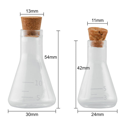 Laboratory Glass Flasks with Corks ... by Tim Holtz Idea-Ology - Use for mixed media, assemblage projects, off-the-page marvels and party decor. Pack of 2 (two) triangular shaped glass bottles with cork lids. Sizes are 24mm x 42mm tall and 30mm x 54mm tall, plus the height of the little corks. One of each size. Add to your project, off-the-page marvel, canvas or other artistic creation and attach using trimmings, fasteners or collage medium. TH94144