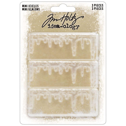 Mini Icicles - by Tim Holtz Idea-Ology ... sculpted translucent trim made of clear plastic in the shape of drippy looking edges. Add to your cards, artwork, display box, frame or other project. 3 (three) pieces each 2 3/4" wide x 1" high. Make these 3 miniature icicle ledges into whatever you wish - icicles, stalactites, drippy paint, drippy candle wax, use up or down (hanging or growing), mud drippy ledges, mossy edging... anything you wish! TH94450. Packaging.