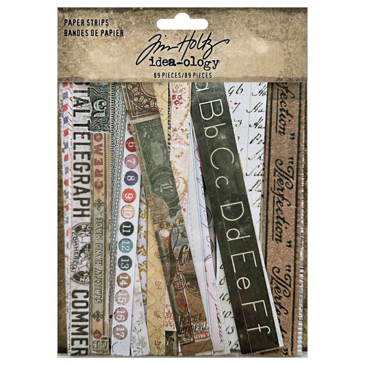 Idea-Ology Paper Strips by Tim Holtz - Printed ephemera featuring vintage designs on ready to use in visual arts and papercrafts. 89 (eighty nine) pieces in a variety of sizes, one of each design in sizes from 9mm wide to 19mm wide, with lengths all 15cm long (6" long).  Tim Holtz Idea-Ology printed papers are die cut and ready to use to create unique artwork, making cards, displaying photos, using as collage fodder, memorabilia and adding onto your marvellous makes. TH94377