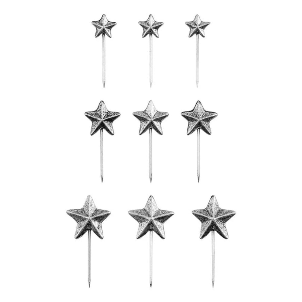 Star Pins, Christmas 2026 ... Idea-Ology Adornments by Tim Holtz. Beautifully made silver coloured sharp pins topped with 5-pointed stars, to use as embellishments for Christmas and other celebrations on display makes, dioramas, mixed media, paper crafts, mixed media and visual arts. 9 (nine) pins, 3 of each sized star. TH94498. Photo of the stars showing smallest at the top and largest at the bottom of the image.