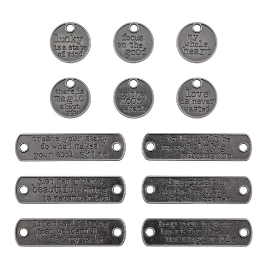 Typed Tags ... Idea-Ology Adornments by Tim Holtz. 12 (twelve) pieces, made of metal in the shape of round and rectangle tags, each with positive and kind messages, used for mixed media, decorating ornaments, home decor makes and visual arts.  Tim Holtz Idea-Ology Metal Adornments are finished in an antique style pewter colour. Ideal for visual arts, sculpture, mixed media canvas, decorating trays, clocks, boxes and frames, bookmaking, junk journaling, scrapbooking. TH94382