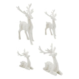 Salvaged Reindeer - Idea-Ology Resin Models by Tim Holtz ... 4 miniature reindeer in white resin, two standing, two lying down. 1 of each size in each design. These beautiful little reindeer (stags, deer) are 3-dimensional models of miniature deer. Sizes (approx) : large standing stag is 3" tall, large sitting stag is 2" high, small standing stag is 2" tall, small sitting stag is 1 1/4" high. Well balanced, each are able to display by themselves without falling over.