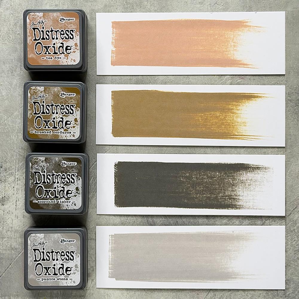 Mini Distress Oxide Ink Pads - Set 18 - by Tim Holtz and Ranger ... featuring water-reactive dye and pigment ink fusion that creates an oxidised effect when spattered, stamped, brushed and or sprayed with water. The colours are opaque and dry with a soft matte finish. Set of 4 (four) colours in Mini Ink Pad Cubes with 1" square raised felt, one of each (TDIK91646).
Colours in this set are ...
- Tea Dye
- Brushed Corduroy
- Scorched Timber
- Pumice Stone
... one of each colour.