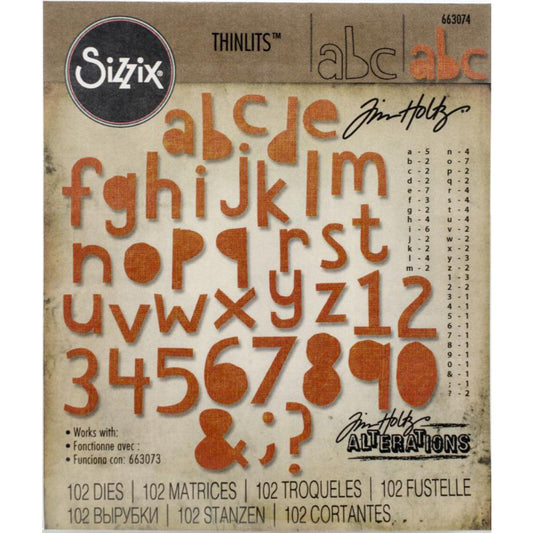 Cut Out Lower - Sizzix Thinlits die cutting templates by Tim Holtz. Use this wonderfully quirky alphabet to create words, thoughts and quotes out of kraftstock, cardstock, felt and paper for journaling, bookmaking, papercrafts, visual arts and scrapbooking. 102 templates of lower case letters, numbers and punctuation, with multiples of most characters (no.663074). Photo of vintage packaging.