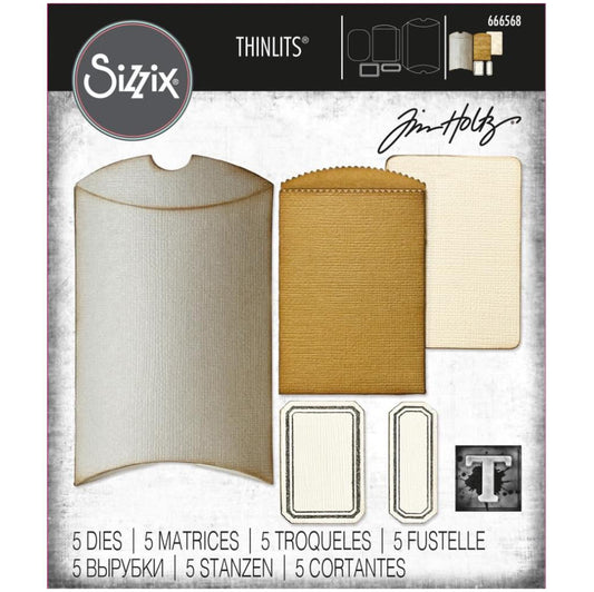 Pillow Box and Bag - Sizzix Thinlits die cutting templates by Tim Holtz. Create personalised pockets, pillowboxes, evenlopes, cards and labels out of paper, cardstock, vellum and tissue for mixed media, papercrafts, scrapbooking, bookmaking and more (no.666568). 5 (five) templates.
This set of Thinlits and Framelits include designs that will enable you create a fantastic selection of gift boxes with eye-shaped ends, vintage style labels with indented borders, journal fodder, junk journal pages, scrapbooks.