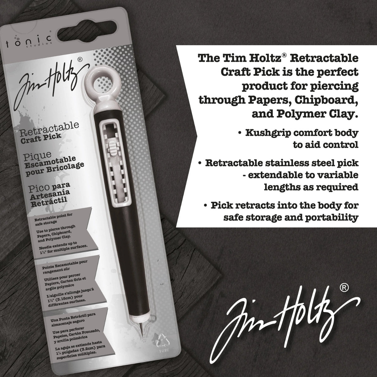 Retractable Craft Pick - by Tim Holtz and Tonic Studios ... this is a 5" long visual arts tool with a black Kushgrip rubber handle, hanging loop and easy to use switch. Use the long steel point for poking holes, lifting layers, clearing nozzles, extends up to 1.25 inches and holds safely in place at various depths. Photo from Tonic Studios, showing tool packaging with information.