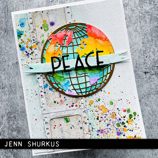 colourful globe with the word peace by Jenn Shurkus - made using World Travel - from the Vault ... Thinlits Die Cutting Templates by Tim Holtz, made by Sizzix (no.666606). Brought back to life by Tim and Sizzix, these vintage designs have been reimagined as Thinlits die cutting templates for art and creativity. These designs cut out an Art Deco style alphabet and numbers (uppercase), with arrows and pieces to create a world globe and aeroplane.