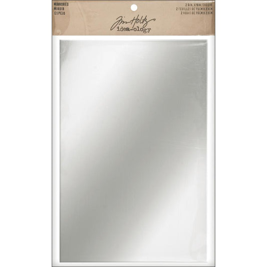 Mirrored Sheets ... Idea-Ology Surfaces by Tim Holtz - highly reflective mirror finish backed onto heavyweight cardstock that has an adhesive backing. 2 (two) sheets, 6"x9" (22.8cm x 15.3cm).  Tim Holtz's Idea-Ology Mirrored sheets have a very clean and shiny, reflective material that can be altered, stamped, inked, used in a die cutting machine, cut with scissors or craft knife, embossed and coloured with alcohol inks. Each sheet is adhesive backed for ease of application to your project.