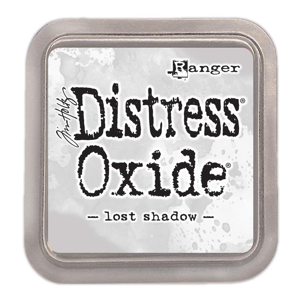 Lost Shadow - Distress Oxide Ink Pad by Tim Holtz and Ranger (also called stamp pad or InkPad), a square of felt that is used for applying ink to rubber and clear stamps or creating backgrounds using a craft mat (swiping, smooshing and marbelling). Ink pad casing is 3"x3", the felt is 2"x2".