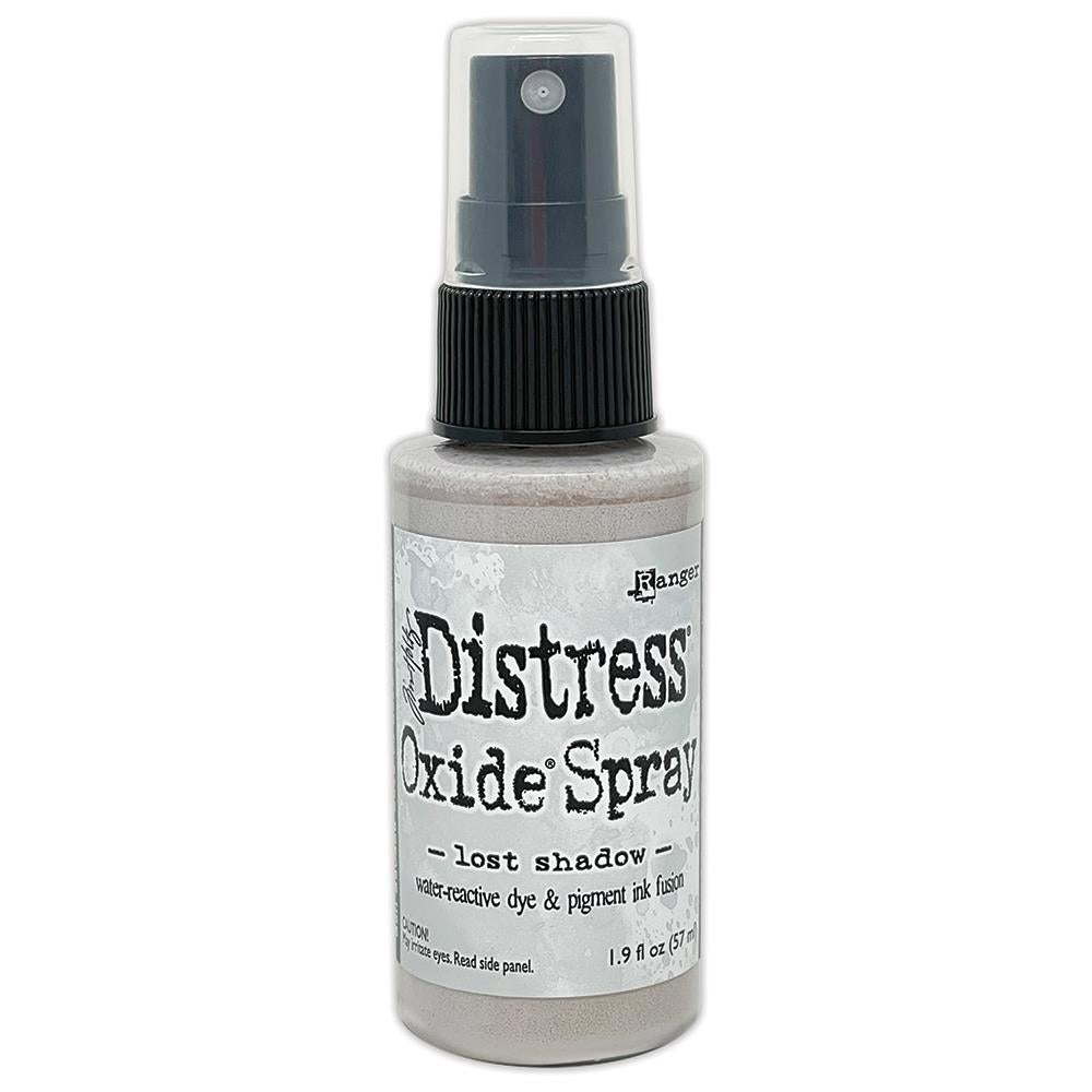 Lost Shadow - Tim Holtz Distress Oxide Spray Stains to use for quick and easy colourful coverage on porous surfaces (fabric, ribbons, papers, chipboard, wood). Spray through stencils, layer colours, spritz or flick with water and watch the colours mix and blend. Fantastic for all kinds of visual arts including cardmaking, scrapbooking, mixed media and journaling. Made by Ranger - For sale in Australia at Art by Jenny