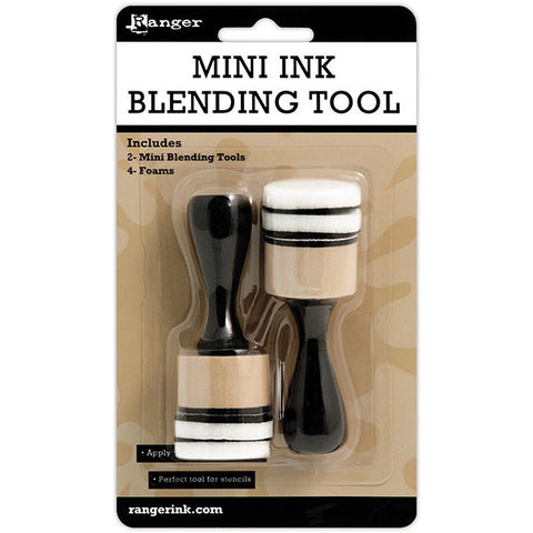 The Tim Holtz and Ranger Mini Ink Blending Tool is an ergonomic, wooden handle with a base for removable round washable foam pads, used to blend inks and paints..