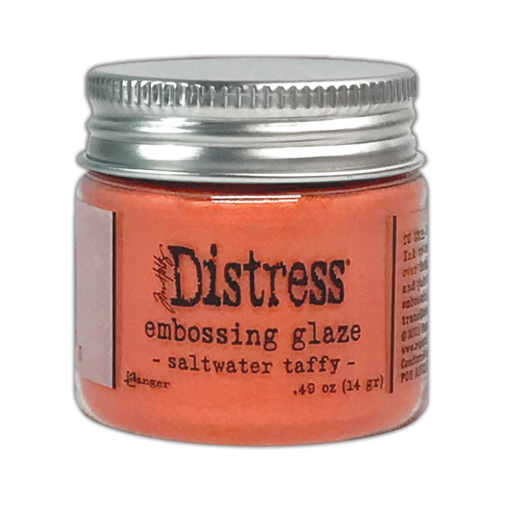 Distress Embossing Glaze by Tim Holtz and Ranger. Distress Embossing Glaze is a fine embossing powder that once melted with a heat tool, creates a colourful tinted semi translucent and slightly textured glazing effect (like a varnish or enamel). Ideal for lettering, stamped images, stenciled areas, abstracts, backgrounds, cardmaking, mixed media, visual arts. Layer over other Distress inks, paints and stains for an unlimited colour palette. Photo of Saltwater Taffy.