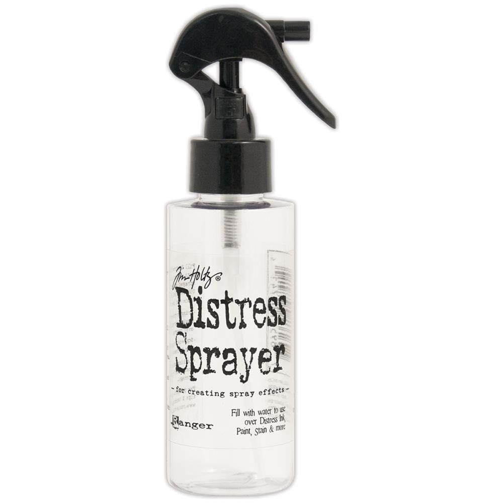 Distress Sprayer - by Tim Holtz and Ranger ... Empty spritzer bottle for spray effects in art ... holds up to 4 fl oz. Use with water or ink, has a locking mechanism (flip switch) for travel and storage. Pack contains 1 (one) empty 4 (four) fluid ounce bottle with large trigger sprayer, clear plastic with black sprayer. Overall size is 16cm high, main part of the bottle is 93mm x 43mm wide.