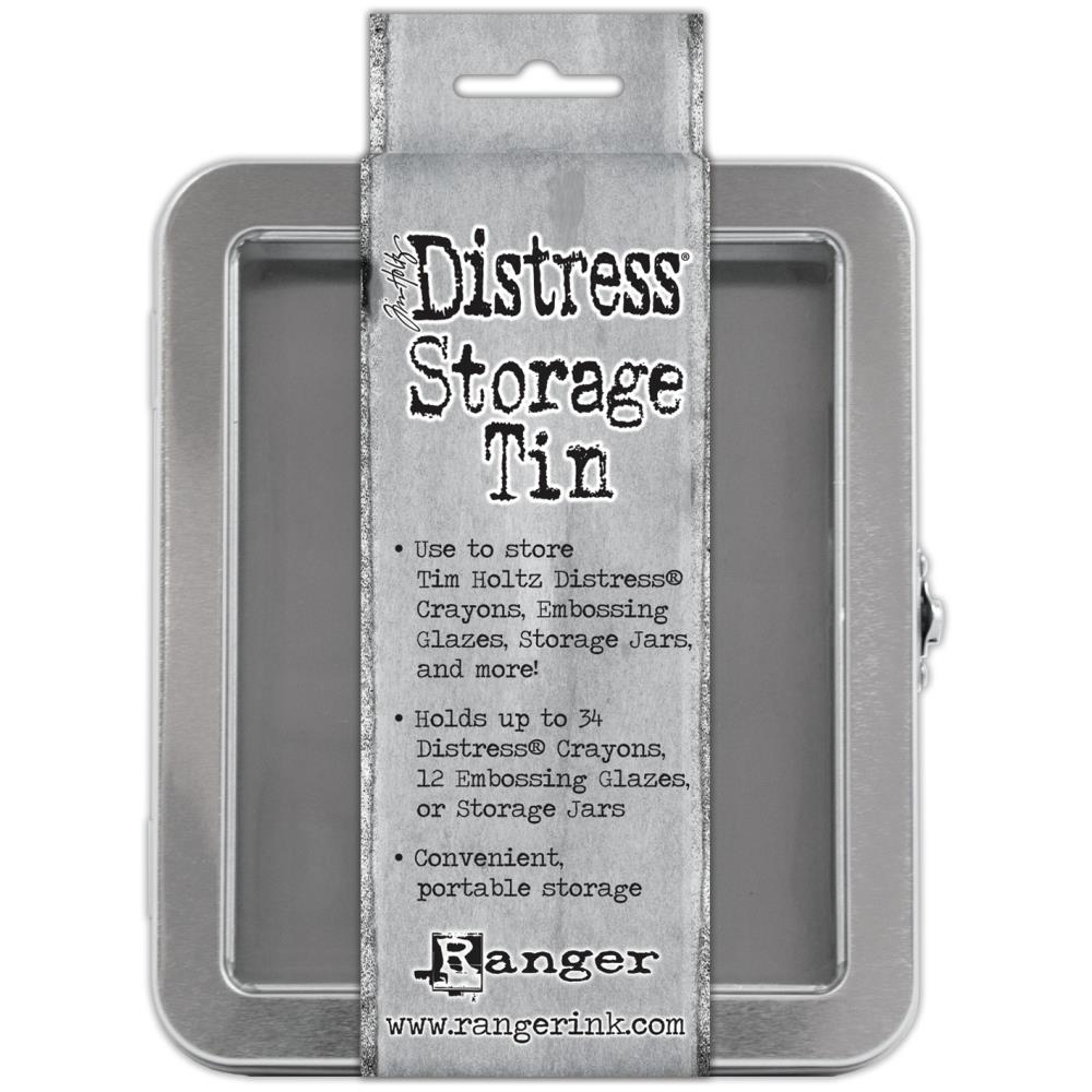 Distress Storage Tin ... by Tim Holtz and Ranger - 1 (one) empty metal container with hinged lid and window. Originally named the "Distress Crayon Storage Tin". Holds up to ... - 34 x Distress Crayons, - 12 x Distress Embossing Glaze, - 12 x Ranger and Distress 1oz sized jars, - 12 x jars of Ranger Stickles Gel, - 70 x Distress Woodless Watercolour Pencils, - 4 x rolls of Idea-Ology Collage paper, ... and anything else you can fit in this handy sized tin. Tin size : (approx) 6" x 7" x 2".