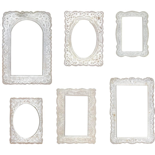 Lace Baseboard Frames - by Tim Holtz Idea-Ology ... Rectangle 2mm thick frames made from bookboard (dense chipboard), in various sizes and beautiful vintage lace designs The Lace Frames have shaped edges and intricate embossed designs on the white borders with open areas for photos, artwork, mixed media, imagery and more. Sizes vary 3" x 4 1/4" to 4 1/2" x 6 1/2". Pack contains 6 (six) pieces, one of each design. Designed by Tim Holtz, made by Advantus Corp for Idea-Ology. TH93786.