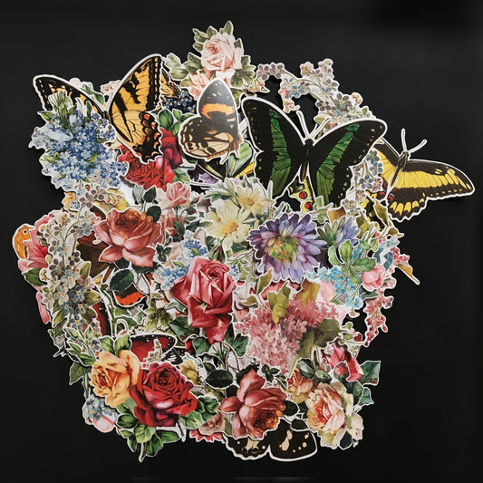 Botanical - Idea-Ology Layers ... by Tim Holtz ... over 80 gorgeous images die cut, ready to use. Made of thin durable cardstock with a satin finish. Over 80 assorted die-cut pieces, neatly trimmed out of quality cardstock with only a fraction of a white border around the image. Ready to use at a moment's notice. Designs include beautiful vintage illustrations of roses, blooms, daisies, bouquets, posies and single flowers with a variety of butterflies in different sizes, colours and species.