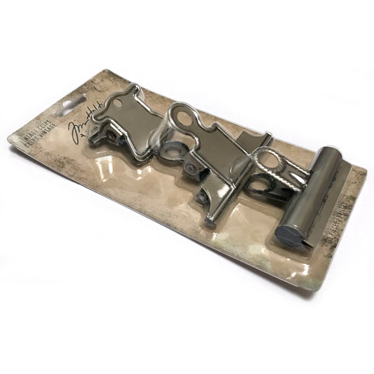 Tim Holtz Idea-Ology Vintage Clips made by Advantus Corp, photo by Art by Jenny shown at an angle. Sizes are approx (as shown in the photo) ...  - top : 1 3/4" wide - middle : 3" wide - bottom : 2 1/2" wide ... all 3 would hold at least a 1cm thick wad of paper.