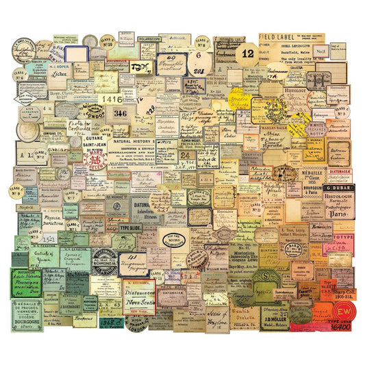 Curator - Snippets Ephemera ... Die Cut Embellishments and Layers - by Tim Holtz Idea-Ology. Over 230 little pieces of labels and vintage imagery printed on fine paper, precut and ready to use in visual arts and papercrafts. Use for junk journals, tags, embellishing envelopes, mixed media, card making, assemblage projects, using as labels for tiny bottles, decorating seasonal display makes, layering in collage. Pack of 233 little tiny die cut paper pieces. Sizes and designs vary up to an inch wide. TH94152