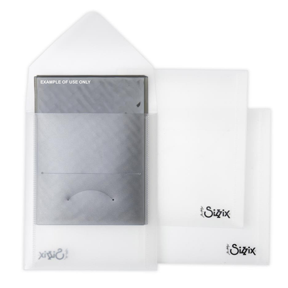 Storage Envelopes, Portrait - Fits Embossing Folders ... by Tim Holtz and Sizzix. Plastic clear pockets with flap enclosure. Pack of 3 (three) empty envelopes (Sizzix no.66550). Each is 5 1/4" x 6 3/4" high.  Tim Holtz's Sizzix semi-translucent plastic envelopes are ideal for storing die cutting templates and embossing folders, to feel organised in a stylish and practical way.  Photo showing example of use