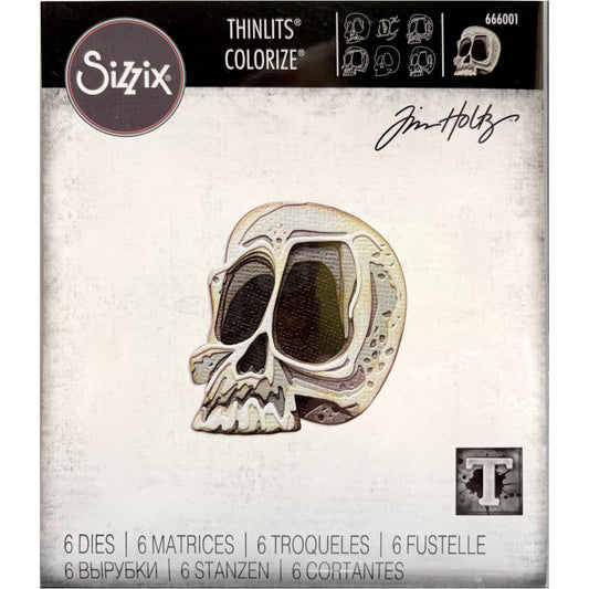 Spencer  ... Thinlits - Colorize Die Cutting Templates by Tim Holtz and Sizzix (no. 666001).  set to cut out or emboss a skull with large eyes