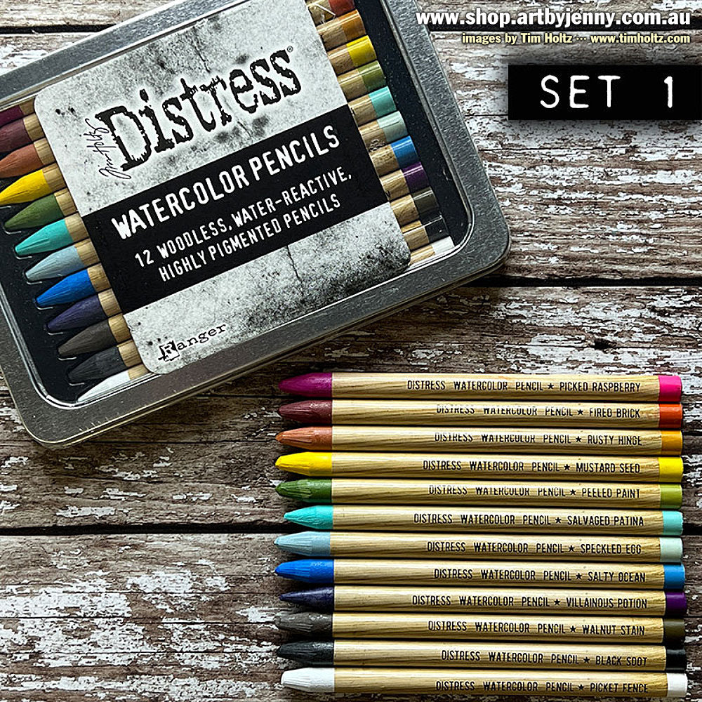 Distress Watercolour Pencils, set 1 ... by Tim Holtz. 12 (twelve) woodless watercolour pencils in Picked Raspberry, Fired Brick, Rusty Hinge, Mustard Seed, Peeled Paint, Salvaged Patina, Speckled Egg, Salty Ocean, Villainous Potion, Walnut Stain, Black Soot, Picket Fence. One of each colour.
