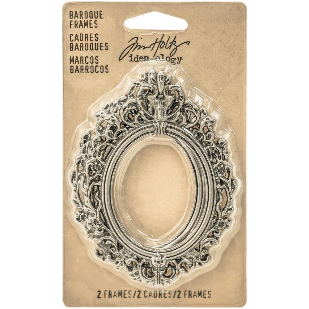 Baroque Frames ... by Tim Holtz Idea-Ology - 2 (two) beautifully detailed metal antique style oval frames to showcase images or layer into dimensional mixed media. This pair of beautiful metal frames are perfect for using with artwork or photos on its own or in albums, add to greeting cards, and use in journaling and mixed media. Sizes approx : outer frame is 2 3/16" x 3" high, inner oval is 1 5/16" x 1 1/8" high.